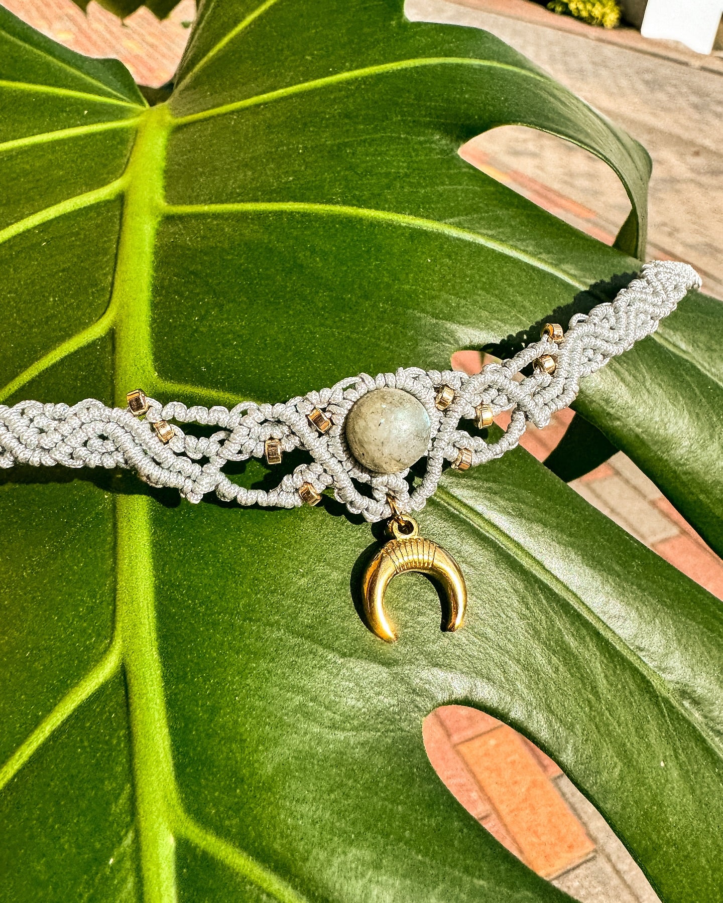 Macrame necklace with labradorite and the symbol of the Moon